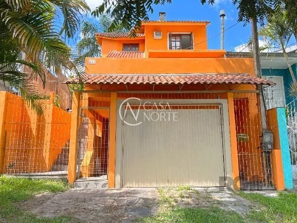 Casa à venda com 2 quartos, 144m², 2 vagas, Rua Orquidea no bairro Lomba do Pinheiro em Porto Alegre