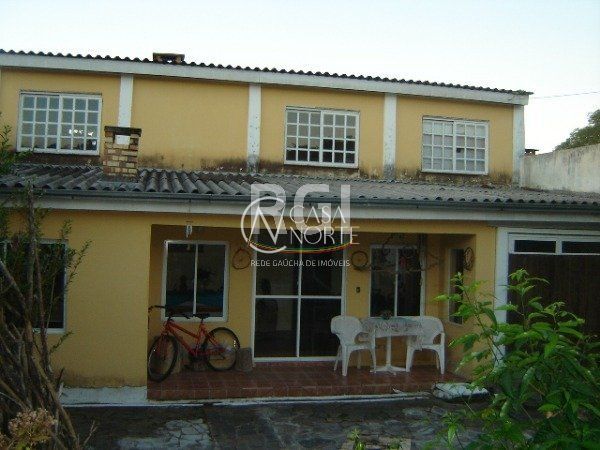 Casa à venda com 4 quartos, 150m², 2 suítes, 6 vagas, Rua Professora Celia Lang Lisboa no bairro Aberta dos Morros em Porto Alegre