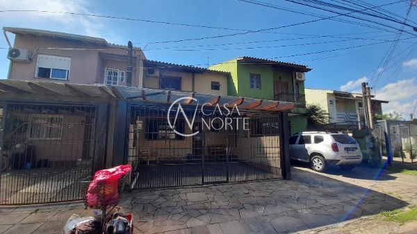 Casa à venda com 3 quartos, 133m², 2 vagas, Rua Michael Motta Seelig no bairro Hípica em Porto Alegre