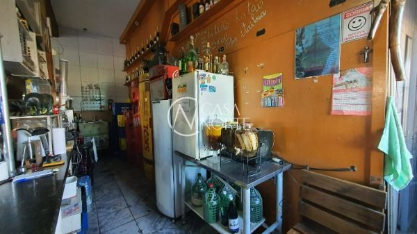 Prédio Comercial à venda com 4 quartos, 353m², 3 suítes, 2 vagas, Rua Elvira Dendena no bairro Hípica em Porto Alegre