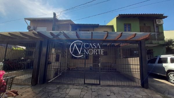 Casa à venda com 3 quartos, 133m², 2 vagas, Rua Michael Motta Seelig no bairro Hípica em Porto Alegre