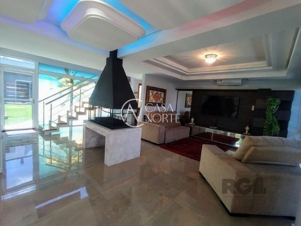 Casa à venda com 3 quartos, 450m², 1 suíte, 2 vagas, Rua Luzinete Alves Aragon no bairro Hípica em Porto Alegre