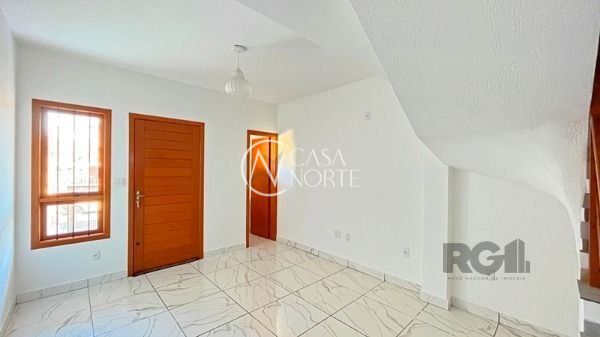 Casa à venda com 2 quartos, 79m², 2 suítes, 2 vagas, Rua Helio Felix Frey no bairro Espírito Santo em Porto Alegre