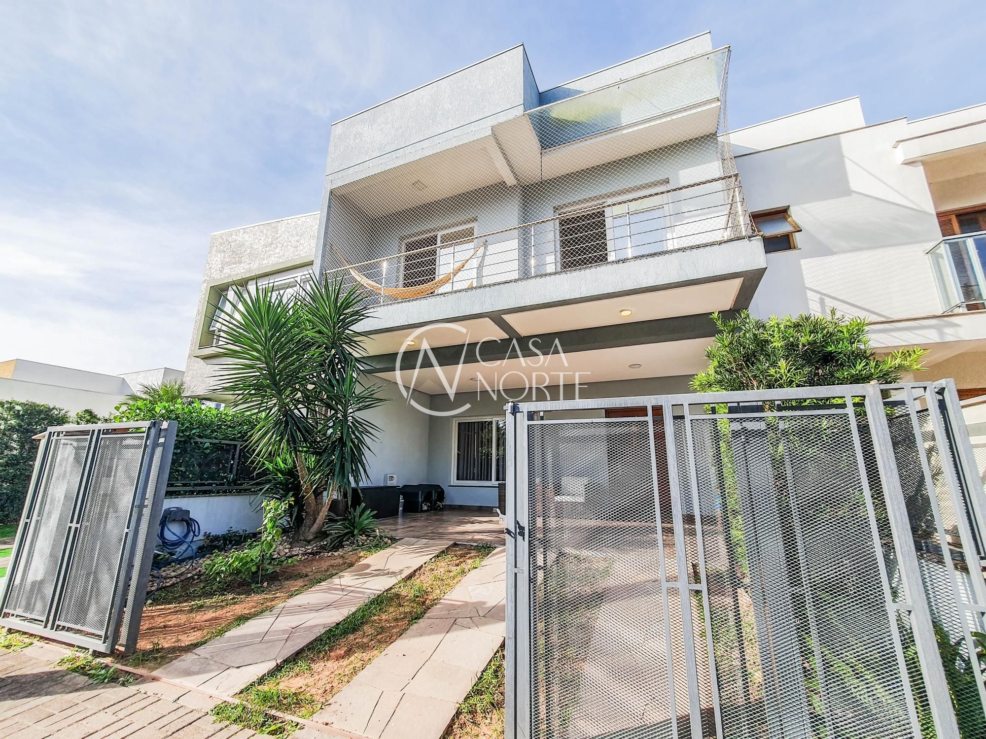 Casa de Condomínio à venda com 4 quartos, 220m², 4 suítes, 2 vagas, Rua Jean Vardaramatos no bairro Hípica em Porto Alegre