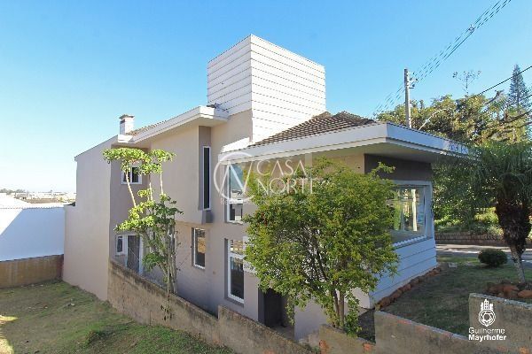 Casa de Condomínio à venda com 3 quartos, 280m², 1 suíte, 5 vagas, Rua Francisco Solano Borges no bairro Aberta dos Morros em Porto Alegre