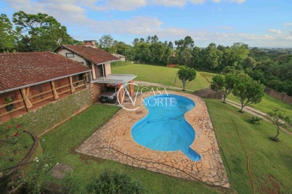 Sítio à venda com 4 quartos, 6500m², 2 suítes, 3 vagas, Estrada Luiz Bettiol no bairro Hípica em Porto Alegre