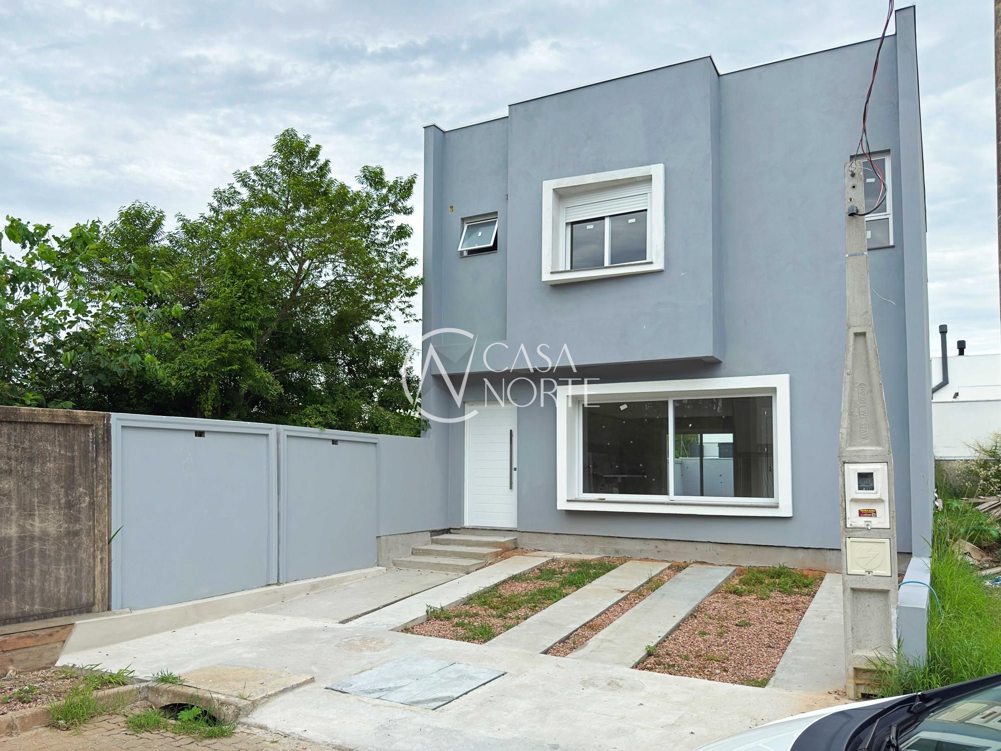 Casa à venda com 3 quartos, 140m², 1 suíte, 2 vagas, Rua Irany de Oliveira Santanna no bairro Hípica em Porto Alegre