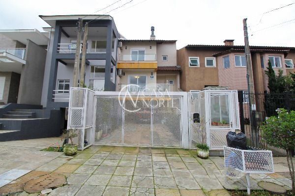 Casa à venda com 3 quartos, 171m², 1 suíte, 4 vagas, Rua Fabiana Kila de Ávila no bairro Hípica em Porto Alegre