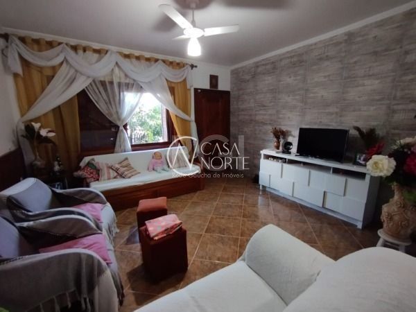 Casa à venda com 3 quartos, 180m², 1 suíte, 3 vagas, Rua Raffaele Nigro no bairro Hípica em Porto Alegre