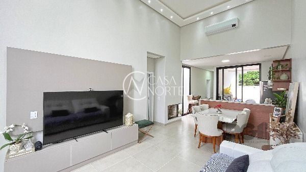 Casa de Condomínio à venda com 3 quartos, 100m², 1 suíte, 2 vagas, Rua Carlos Maximiliano Fayet no bairro Hípica em Porto Alegre