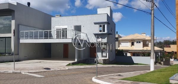 Casa de Condomínio à venda com 3 quartos, 225m², 3 suítes, 3 vagas, Rua Ivo Walter Kern no bairro Hípica em Porto Alegre