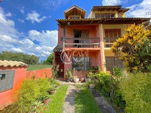 Casa à venda com 2 quartos, 100m², 1 vaga, Rua Professor Paulo Saurin no bairro Hípica em Porto Alegre