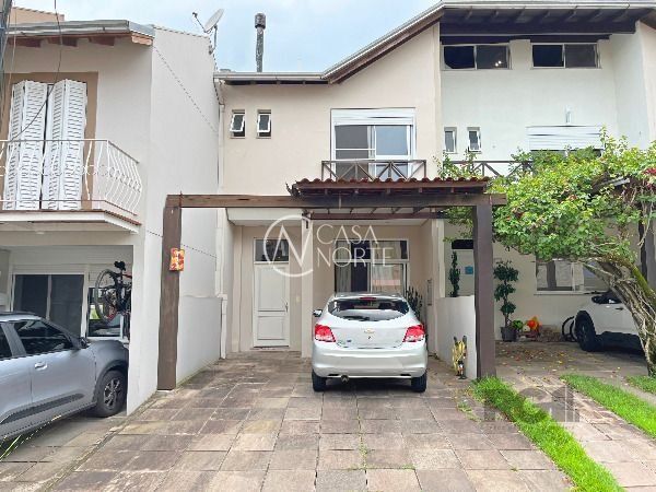 Casa de Condomínio à venda com 3 quartos, 159m², 1 suíte, 2 vagas, Estrada João Salomoni no bairro Vila Nova em Porto Alegre