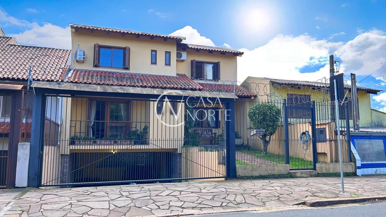 Casa à venda com 3 quartos, 287m², 1 suíte, 3 vagas, Rua Doutor Mário Totta no bairro Tristeza em Porto Alegre