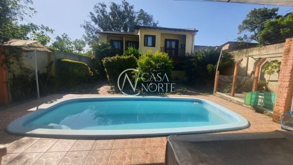 Casa à venda com 3 quartos, 200m², 1 suíte, 1 vaga, Rua Xavier da Cunha no bairro Nonoai em Porto Alegre