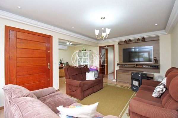 Casa à venda com 5 quartos, 359m², 3 suítes, Rua Moacyr Godoy Ilha no bairro Espírito Santo em Porto Alegre