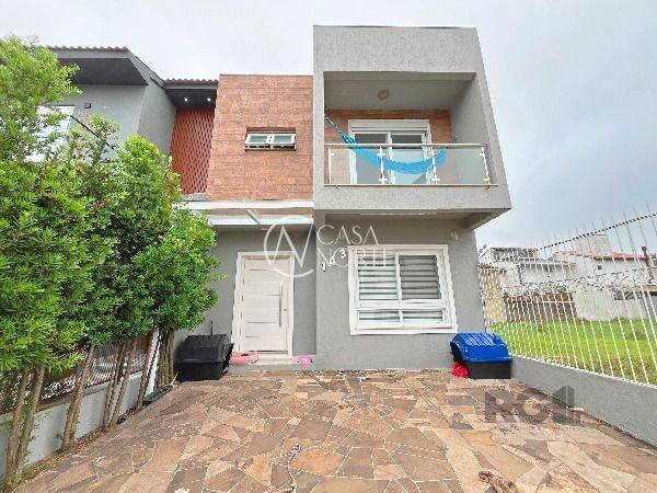 Casa à venda com 3 quartos, 127m², 1 suíte, 2 vagas, Rua Aldo Sani no bairro Hípica em Porto Alegre