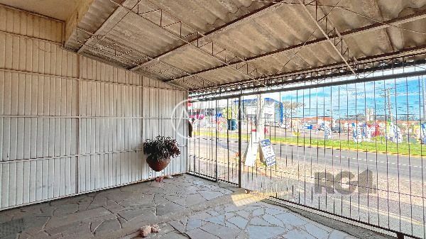 Prédio Comercial à venda , 168m², Avenida Edgar Pires de Castro no bairro Hípica em Porto Alegre