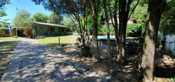 Casa à venda com 3 quartos, 120m², 5 vagas, Rua Hygino Russi Lima no bairro Ponta Grossa em Porto Alegre