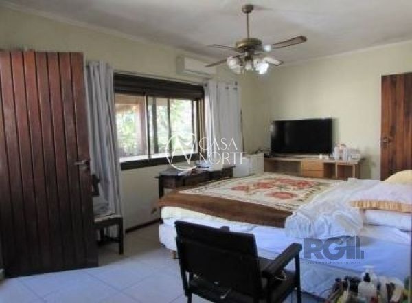 Casa à venda com 4 quartos, 356m², 2 suítes, 4 vagas, Avenida Fabio Araujo Santos no bairro Nonoai em Porto Alegre