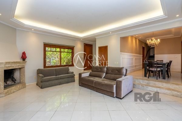 Casa de Condomínio à venda com 3 quartos, 367m², 1 suíte, 2 vagas, Travessa Pedra Redonda no bairro Jardim Isabel em Porto Alegre