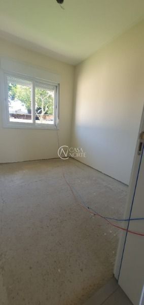 Casa de Condomínio à venda com 3 quartos, 65m², 2 vagas, Rua Criciuma no bairro Guarujá em Porto Alegre