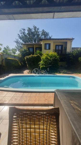 Casa à venda com 3 quartos, 200m², 1 suíte, 1 vaga, Rua Xavier da Cunha no bairro Nonoai em Porto Alegre