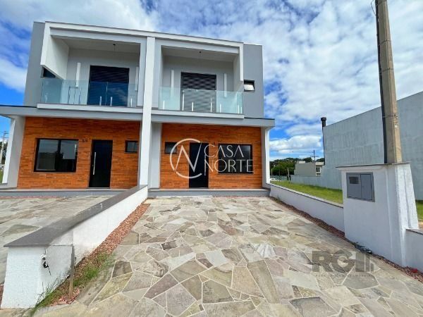 Casa de Condomínio à venda com 3 quartos, 115m², 1 suíte, 2 vagas, Estrada Jorge Pereira Nunes no bairro Campo Novo em Porto Alegre