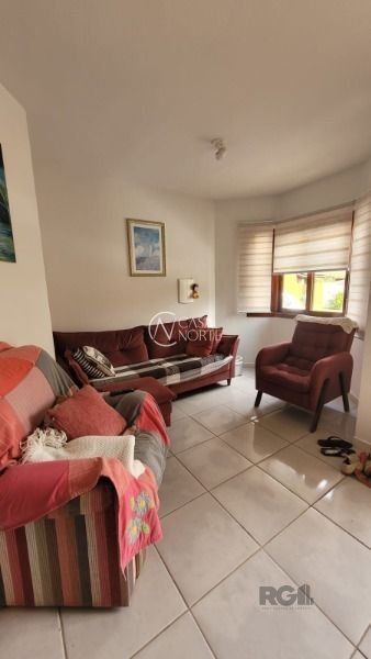 Casa de Condomínio à venda com 2 quartos, 122m², 1 vaga, Avenida Edgar Pires de Castro no bairro Hípica em Porto Alegre