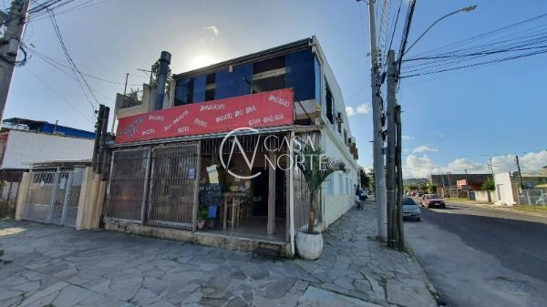 Prédio Comercial à venda com 4 quartos, 353m², 3 suítes, 2 vagas, Rua Elvira Dendena no bairro Hípica em Porto Alegre