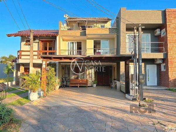 Casa à venda com 3 quartos, 169m², 1 suíte, 4 vagas, Rua Carlos Maximiliano Fayet no bairro Hípica em Porto Alegre