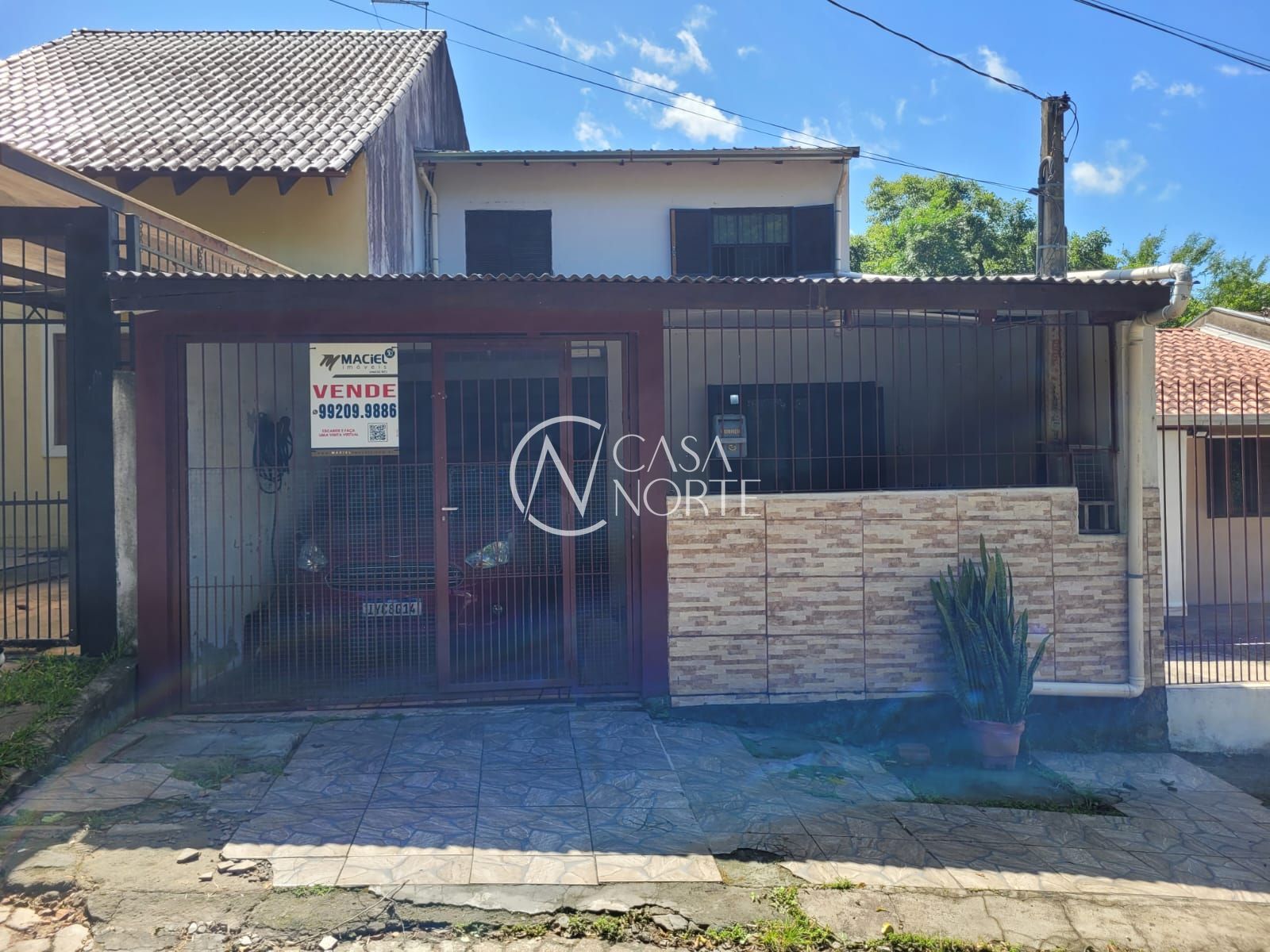 Casa à venda com 4 quartos, 100m², 1 vaga, Rua Júlio Dias de Souza no bairro Aberta dos Morros em Porto Alegre