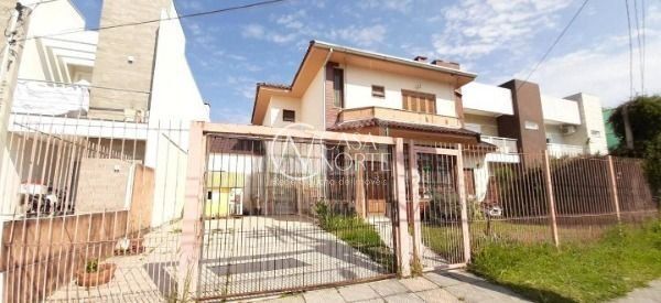 Casa à venda com 5 quartos, 239m², 1 suíte, 4 vagas, Rua Eroni Soares Machado no bairro Hípica em Porto Alegre