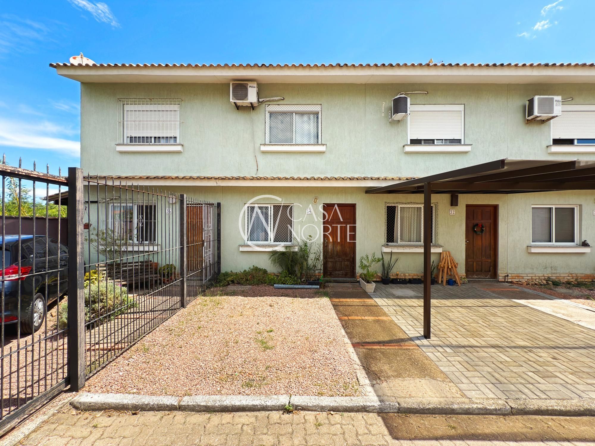 Casa de Condomínio à venda com 2 quartos, 97m², 1 vaga, Rua Dorival Castilhos Machado no bairro Aberta dos Morros em Porto Alegre