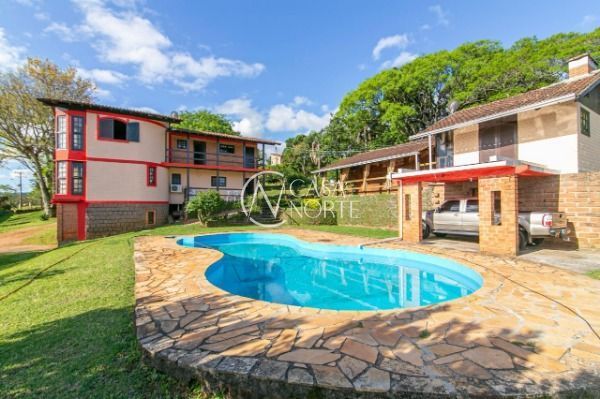 Sítio à venda com 4 quartos, 6500m², 2 suítes, 3 vagas, Estrada Luiz Bettiol no bairro Hípica em Porto Alegre