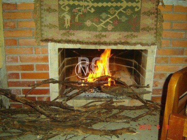Casa à venda com 4 quartos, 150m², 2 suítes, 6 vagas, Rua Professora Celia Lang Lisboa no bairro Aberta dos Morros em Porto Alegre