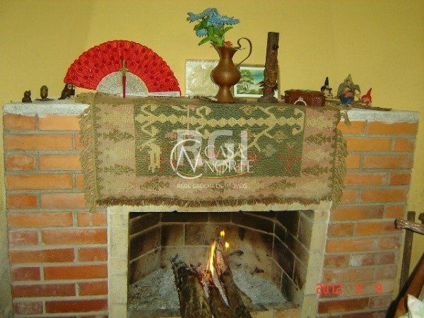 Casa à venda com 4 quartos, 150m², 2 suítes, 6 vagas, Rua Professora Celia Lang Lisboa no bairro Aberta dos Morros em Porto Alegre