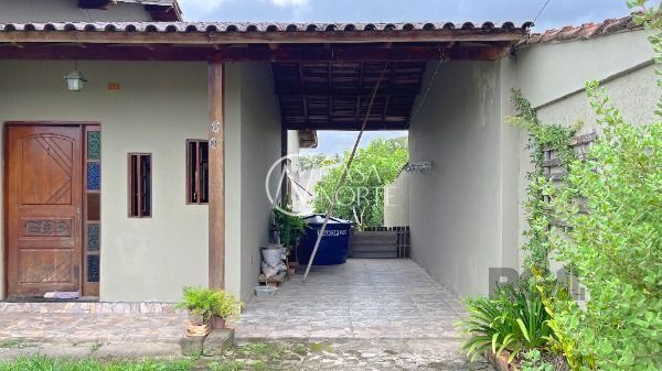 Casa à venda com 3 quartos, 80m², 2 vagas, Rua Bougainville no bairro Lageado em Porto Alegre