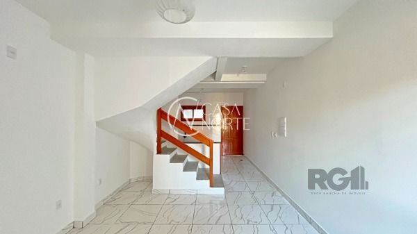 Casa à venda com 2 quartos, 79m², 2 suítes, 2 vagas, Rua Helio Felix Frey no bairro Espírito Santo em Porto Alegre