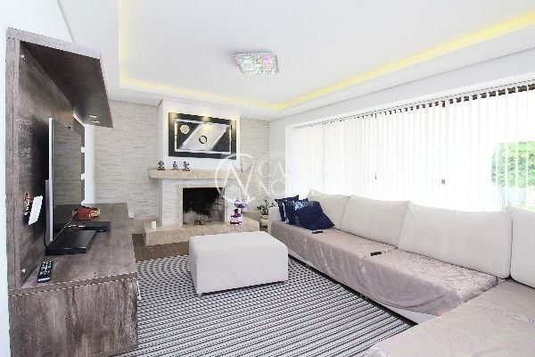 Casa à venda com 4 quartos, 400m², 2 suítes, 4 vagas, Rua Jacunda no bairro Guarujá em Porto Alegre