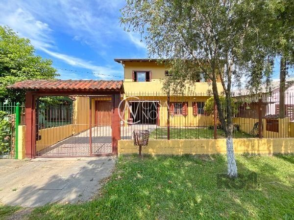 Casa à venda com 3 quartos, 189m², 1 suíte, 2 vagas, Avenida Juca Batista no bairro Hípica em Porto Alegre