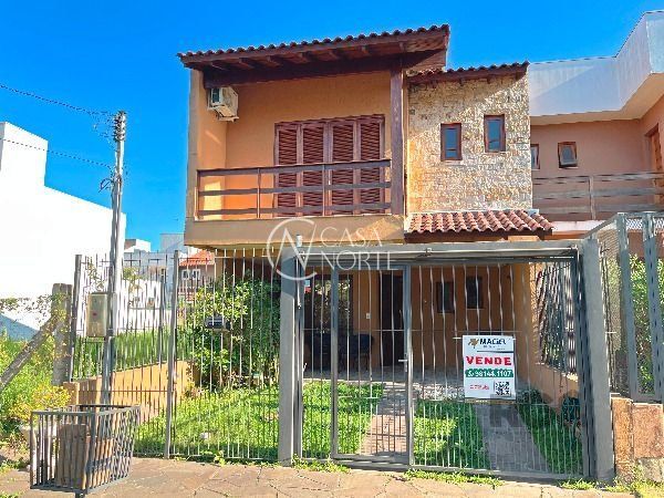 Casa à venda com 3 quartos, 130m², 1 suíte, 2 vagas, Rua Irany de Oliveira Santanna no bairro Hípica em Porto Alegre