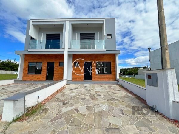 Casa de Condomínio à venda com 3 quartos, 115m², 1 suíte, 2 vagas, Estrada Jorge Pereira Nunes no bairro Campo Novo em Porto Alegre