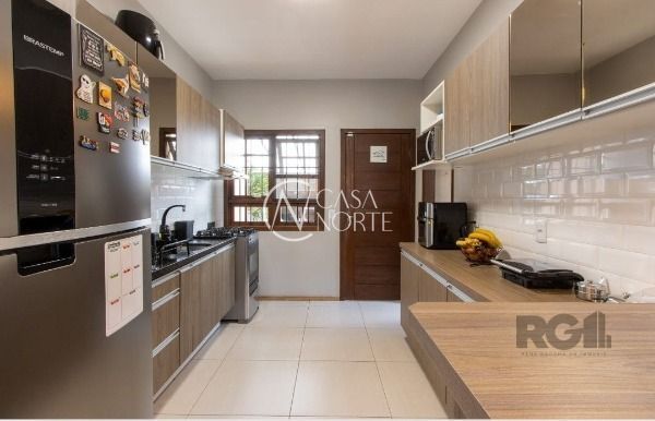 Casa à venda com 5 quartos, 152m², 1 suíte, 2 vagas, Rua Luzinete Alves Aragon no bairro Aberta dos Morros em Porto Alegre