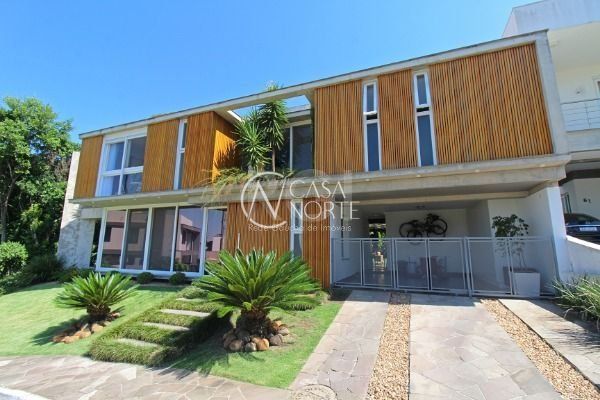 Casa de Condomínio à venda com 3 quartos, 278m², 3 suítes, 2 vagas, Rua Francisco Solano Borges no bairro Hípica em Porto Alegre