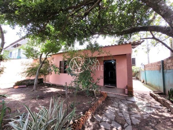 Casa à venda com 5 quartos, 110m², 3 vagas, Avenida Ignes E. Fagundes no bairro Restinga em Porto Alegre