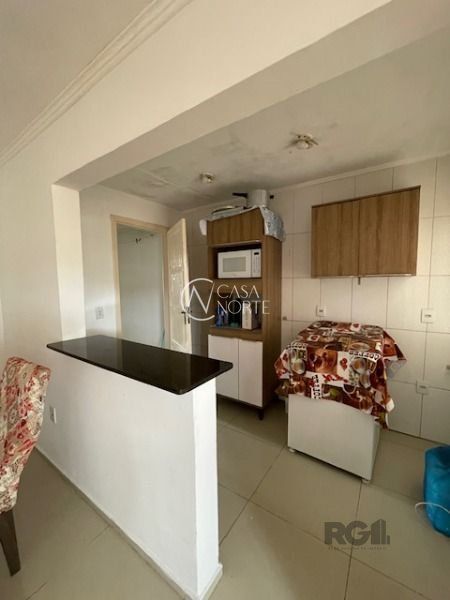 Casa à venda com 2 quartos, 63m², 1 vaga, Rua Delmar Kuhn no bairro Hípica em Porto Alegre