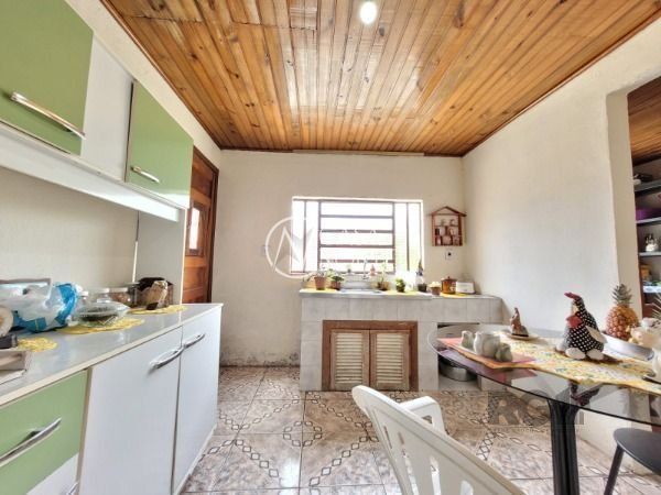 Casa à venda com 5 quartos, 110m², 3 vagas, Avenida Ignes E. Fagundes no bairro Restinga em Porto Alegre