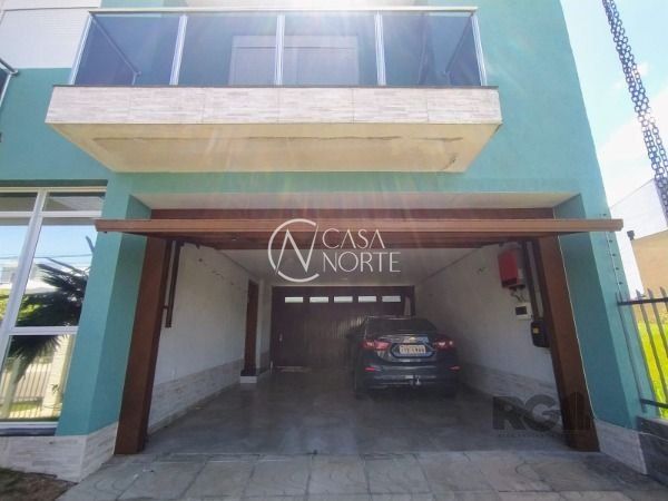 Casa à venda com 3 quartos, 450m², 1 suíte, 2 vagas, Rua Luzinete Alves Aragon no bairro Hípica em Porto Alegre