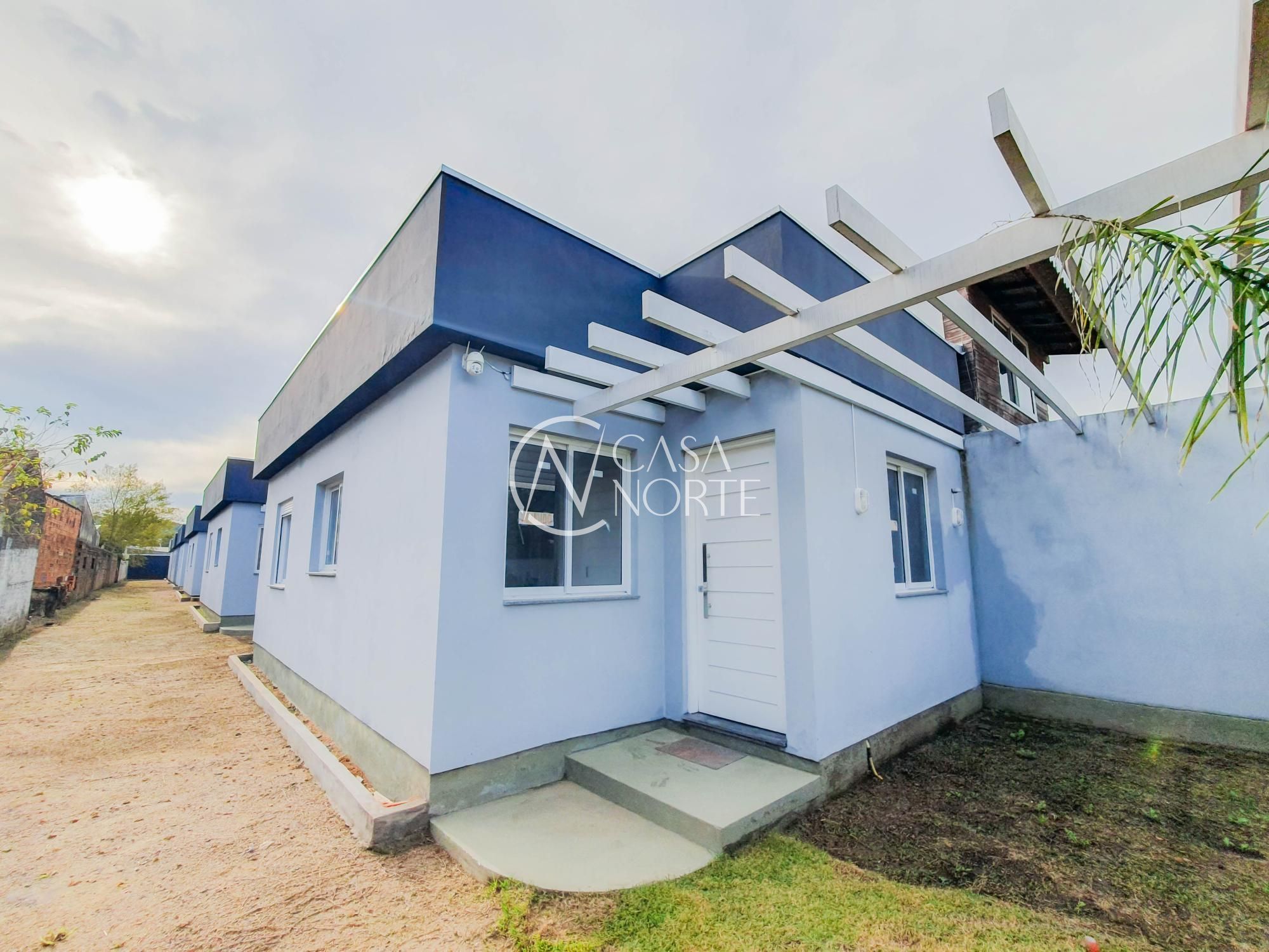 Casa de Condomínio à venda com 2 quartos, 60m², 1 vaga, Rua Jorge Mello Guimarães no bairro Belém Novo em Porto Alegre